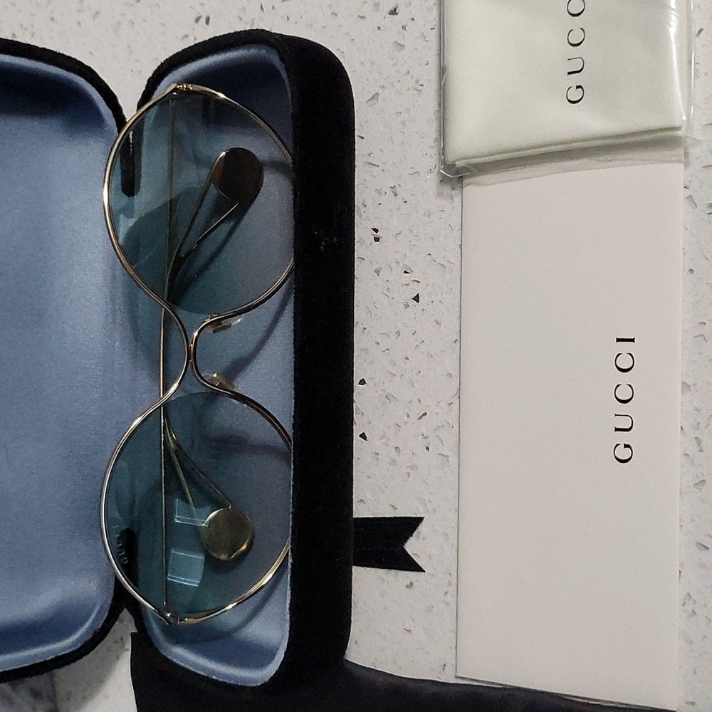 Sunglasses Gucci gold frame